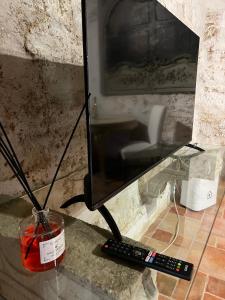 TV a/nebo společenská místnost v ubytování Atrium Experience