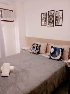 Postel nebo postele na pokoji v ubytování Flats Via Mar