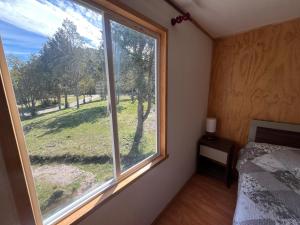 Postel nebo postele na pokoji v ubytování Cabañas el Remanso