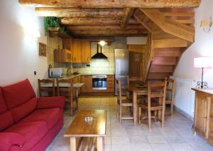 Kuchyň nebo kuchyňský kout v ubytování Apartamentos Fogaron