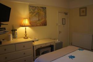 Ένα ή περισσότερα κρεβάτια σε δωμάτιο στο Amazon Guest House +13 φωτογραφίες