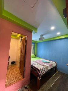 Postel nebo postele na pokoji v ubytování Villa Koh Rong