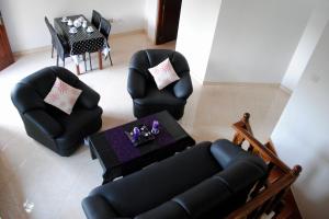 A seating area at Cinnamon Holiday Inn