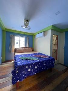Postel nebo postele na pokoji v ubytování Villa Koh Rong