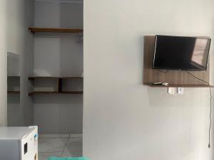 TV a/nebo společenská místnost v ubytování Pousada Aconchego Diamantina