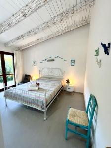 Postel nebo postele na pokoji v ubytování Villa Alzoni