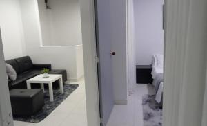 Istumisnurk majutusasutuses Habitación de Lujo para grupo familiar