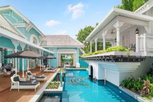 Bazén v ubytování JW Marriott Phu Quoc Emerald Bay Resort & Spa nebo v jeho okolí