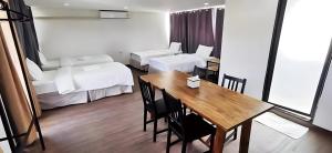 GO INN Chiang Mai University - CMU客房内的一张或多张床位