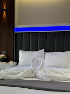 Letto o letti in una camera di Central Block Inn
