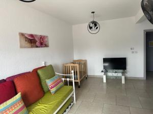 TV a/nebo společenská místnost v ubytování Ibis Tourist Residence 1