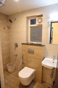 Koupelna v ubytování Vibha by Sri Lakshmi Homes + 23 fotografií