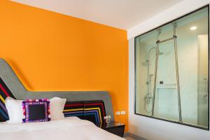 Voodi või voodid majutusasutuse Hotel Selene Chiang Rai toas