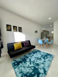 O zonă de relaxare la Hermoso Departamento Kibira Playa del Carmen