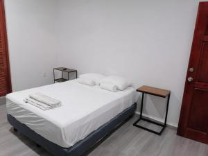 Postel nebo postele na pokoji v ubytování Casa BOSQUE LUCIERNAGAS