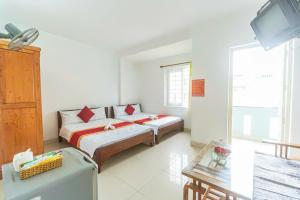 Postel nebo postele na pokoji v ubytování Blue Ocean Hotel - Thiên Thanh - sát bãi sau