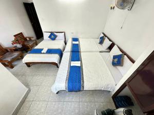 Postel nebo postele na pokoji v ubytování Blue Ocean Hotel - Thiên Thanh - sát bãi sau