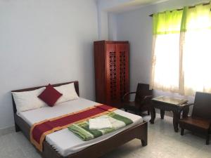 Postel nebo postele na pokoji v ubytování Blue Ocean Hotel - Thiên Thanh - sát bãi sau