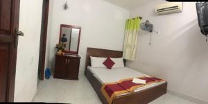 Postel nebo postele na pokoji v ubytování Blue Ocean Hotel - Thiên Thanh - sát bãi sau