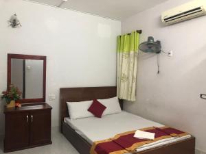 Postel nebo postele na pokoji v ubytování Blue Ocean Hotel - Thiên Thanh - sát bãi sau