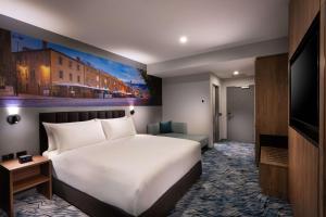 TV a/nebo společenská místnost v ubytování DoubleTree by Hilton Hobart