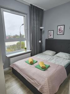 Posteľ alebo postele v izbe v ubytovaní Urban Jungle - Grey Apartment + 8 fotografií