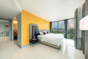 Postel nebo postele na pokoji v ubytování Hotel Selene Chiang Rai - SHA Certified + 37 fotografií