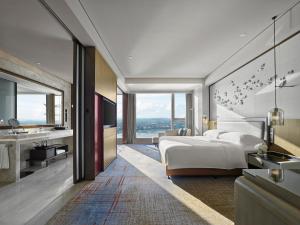 Voodi või voodid majutusasutuse InterContinental Quanzhou by IHG toas