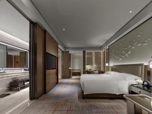 Voodi või voodid majutusasutuse InterContinental Quanzhou by IHG toas