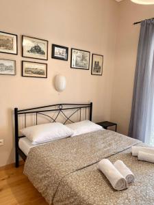 Giường trong phòng chung tại Charming flat with an amazing view
