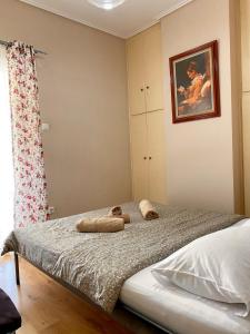 Giường trong phòng chung tại Charming flat with an amazing view