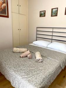 Giường trong phòng chung tại Charming flat with an amazing view