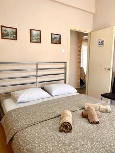 Giường trong phòng chung tại Charming flat with an amazing view
