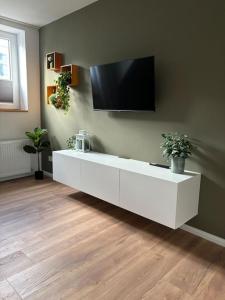 Μια τηλεόραση ή/και κέντρο ψυχαγωγίας στο Geeste-Apartment Bremerhaven