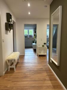 Μια τηλεόραση ή/και κέντρο ψυχαγωγίας στο Geeste-Apartment Bremerhaven +1 φωτογραφίες