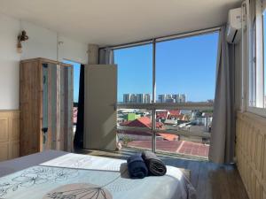 Voodi või voodid majutusasutuse PENTHOUSE 10 MIN port croisière et aéroport toas