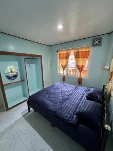 Postel nebo postele na pokoji v ubytování Janzo House