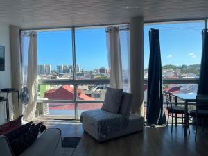 Posezení v ubytování PENTHOUSE 10 MIN port croisière et aéroport
