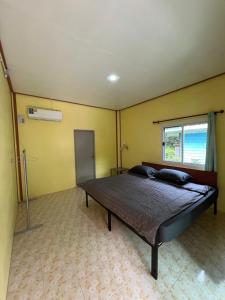 Postel nebo postele na pokoji v ubytování Janzo House