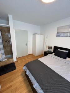 Postel nebo postele na pokoji v ubytování Hotel Thurpark