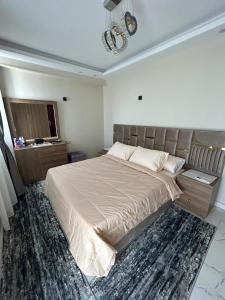 Postel nebo postele na pokoji v ubytování Apartment Hossam - Hurghada