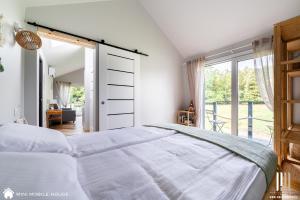 Posteľ alebo postele v izbe v ubytovaní Holiday Hill Karpnki, Sauna, Domek Hygge-balia, Domek Lagom-jacuzzi