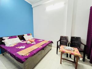 Letto o letti in una camera di Maa vaishno paying guest house