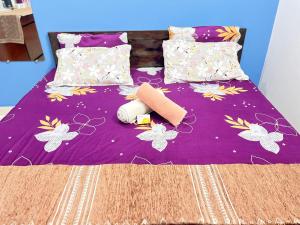 Letto o letti in una camera di Maa vaishno paying guest house