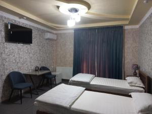 Gambar di galeri bagi Chinor plus hotel di Rishton