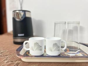 Set per la preparazione di tè e caffè presso Maa vaishno paying guest house