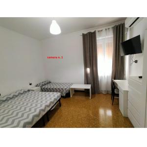 B&B Gaslini & Mare (anche con uso cucina)客房内的一张或多张床位