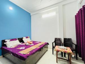 Letto o letti in una camera di Maa vaishno paying guest house