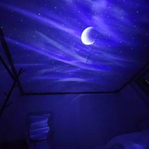 a painting of a night sky with a moon at Anime House in Daejeon
