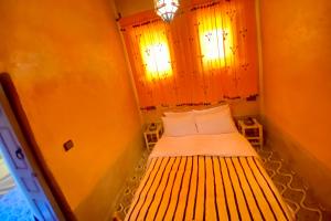 Letto o letti in una camera di Nomadic Birdway